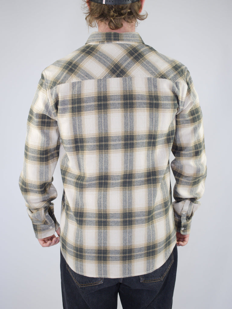 White and gray plaid flannel shirt shown from the back.