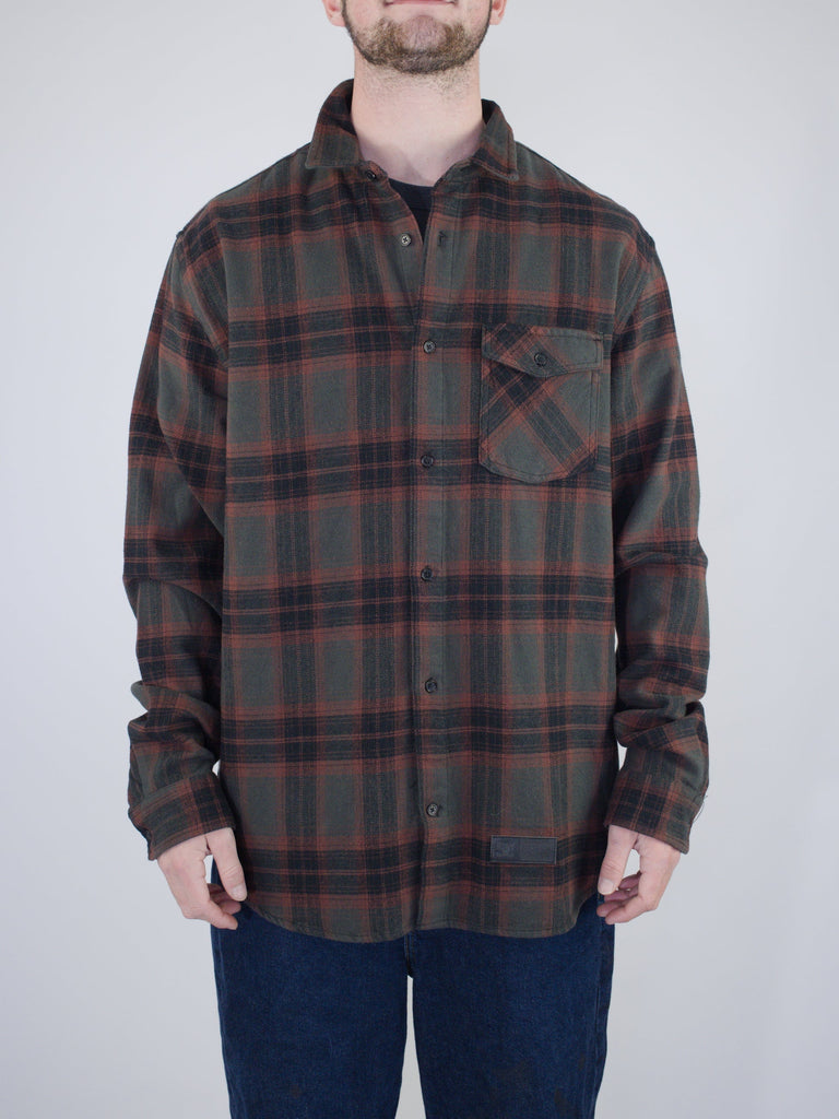 Plaid flannel button-up shirt in dark green and red colors.