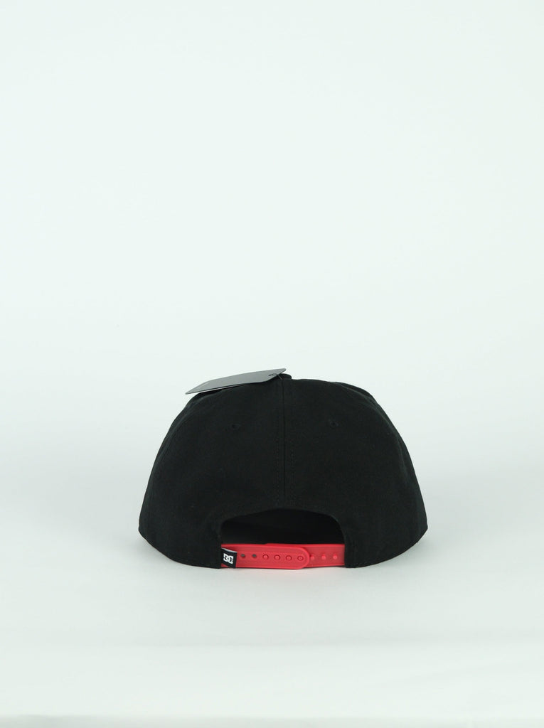 Black snapback cap with red adjustable strap from Dc Shoes Shy Town Empire collection