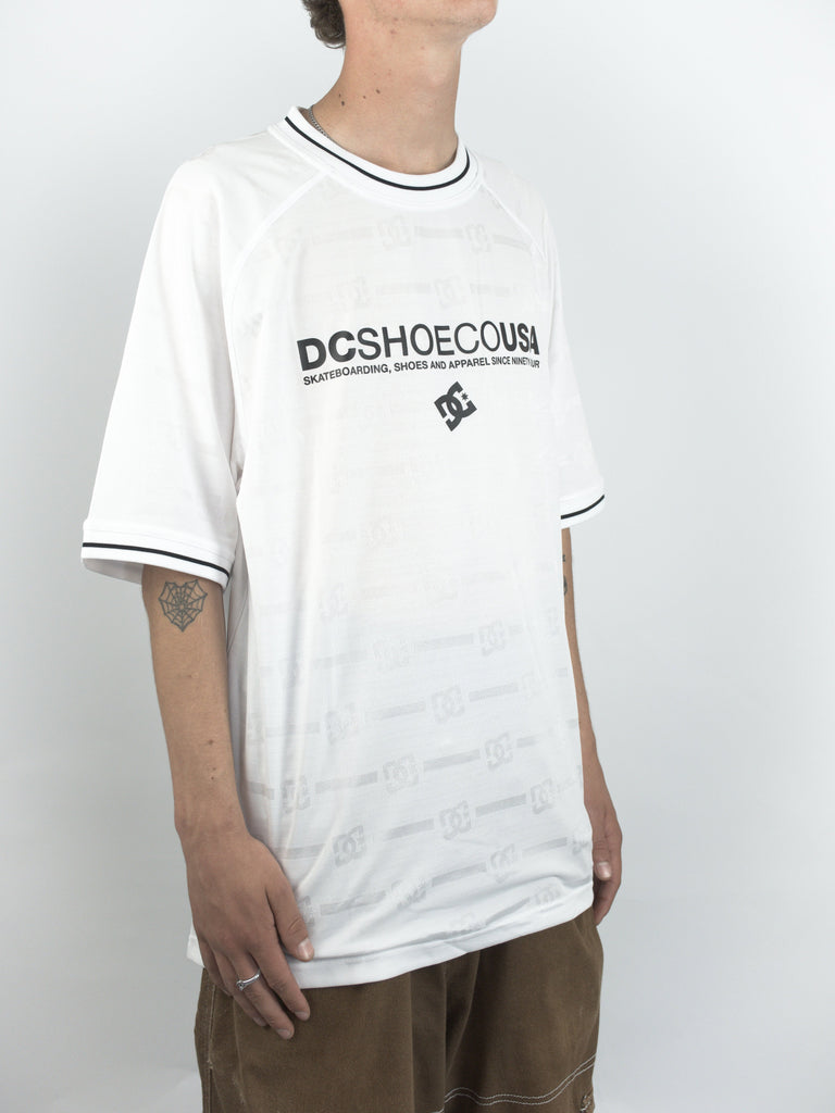 White DC Shoes Super Tour Mesh Jersey featuring black text and trim design