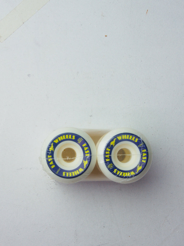 Two white skateboard wheels with blue and yellow circular logos.