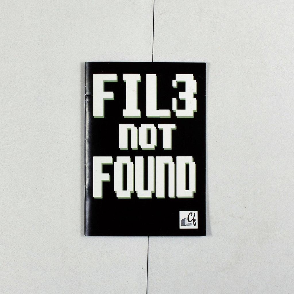 Black book cover for File Not Found issue zine with white text and small logo