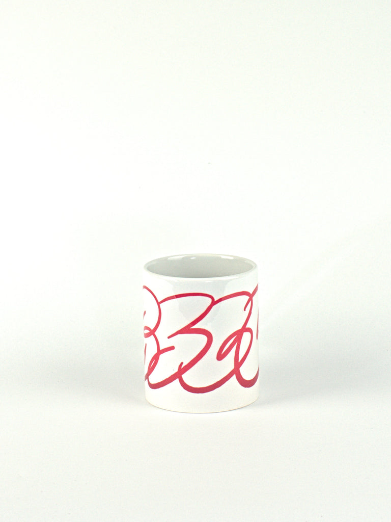 White Grind Supply ceramic coffee mug featuring red abstract design and dub logo