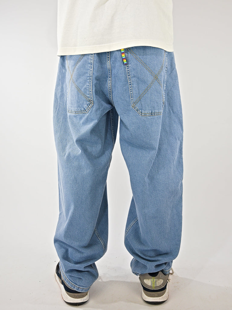 Loose-fitting light blue Monster Baggy Denim jeans with wide legs and back pockets