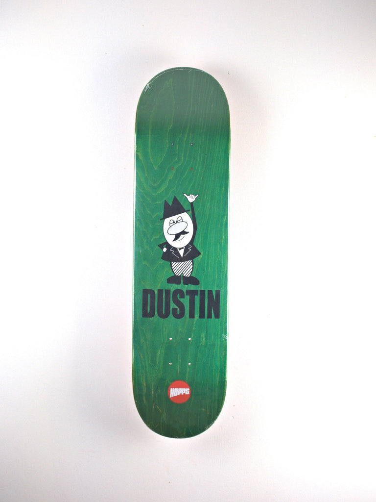 Green skateboard deck showcasing Dustin Eggeling Pro model with cartoon character and name