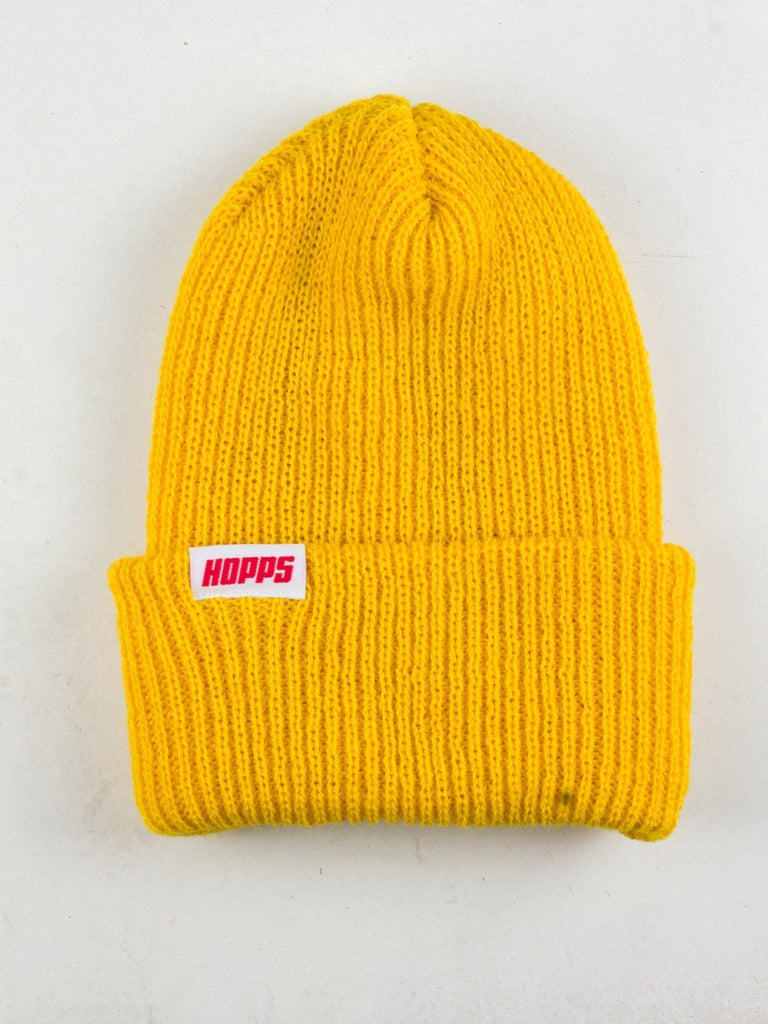 Bright yellow Hopps Tab Beanie in fisherman style mustard with HOOPS logo patch