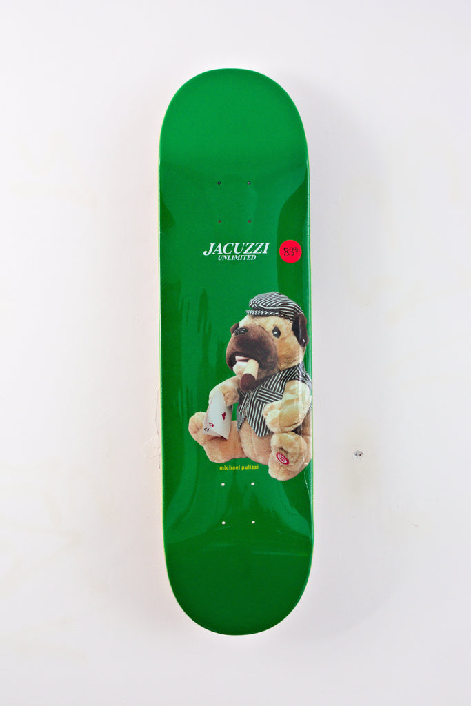 Green skateboard deck featuring a teddy bear wearing winter clothing.