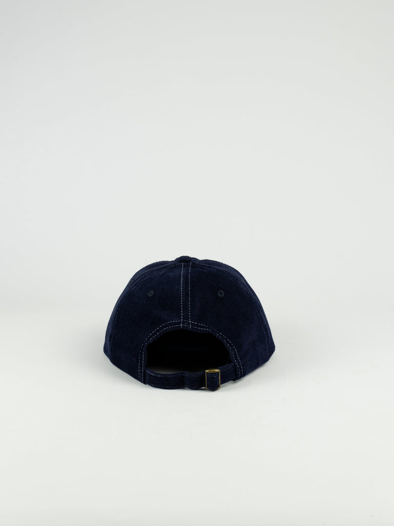 Navy blue Labor Skateshop Pullman Cap with adjustable buckle closed strap closure