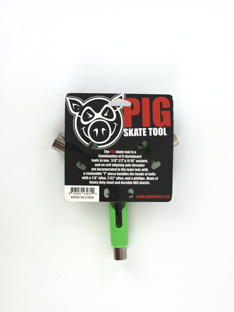 Skateboard tool with a green handle and pig logo on the packaging.