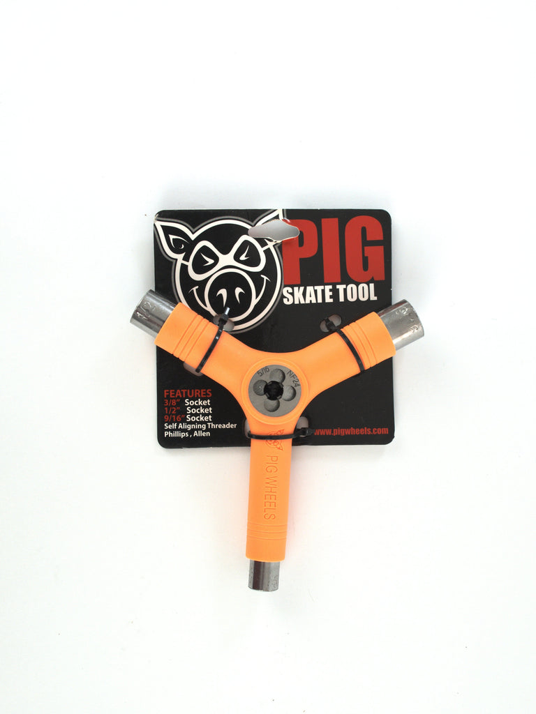 Orange Y-shaped Multi Tool by Pig Wheels with metal attachments and pig logo