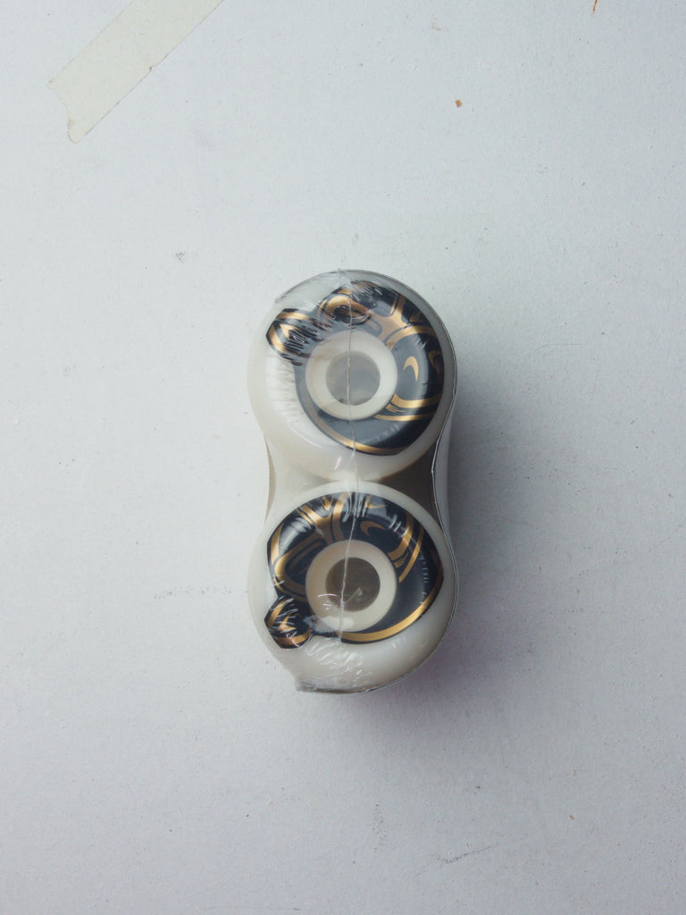 Two connected skateboard wheels with bearings.