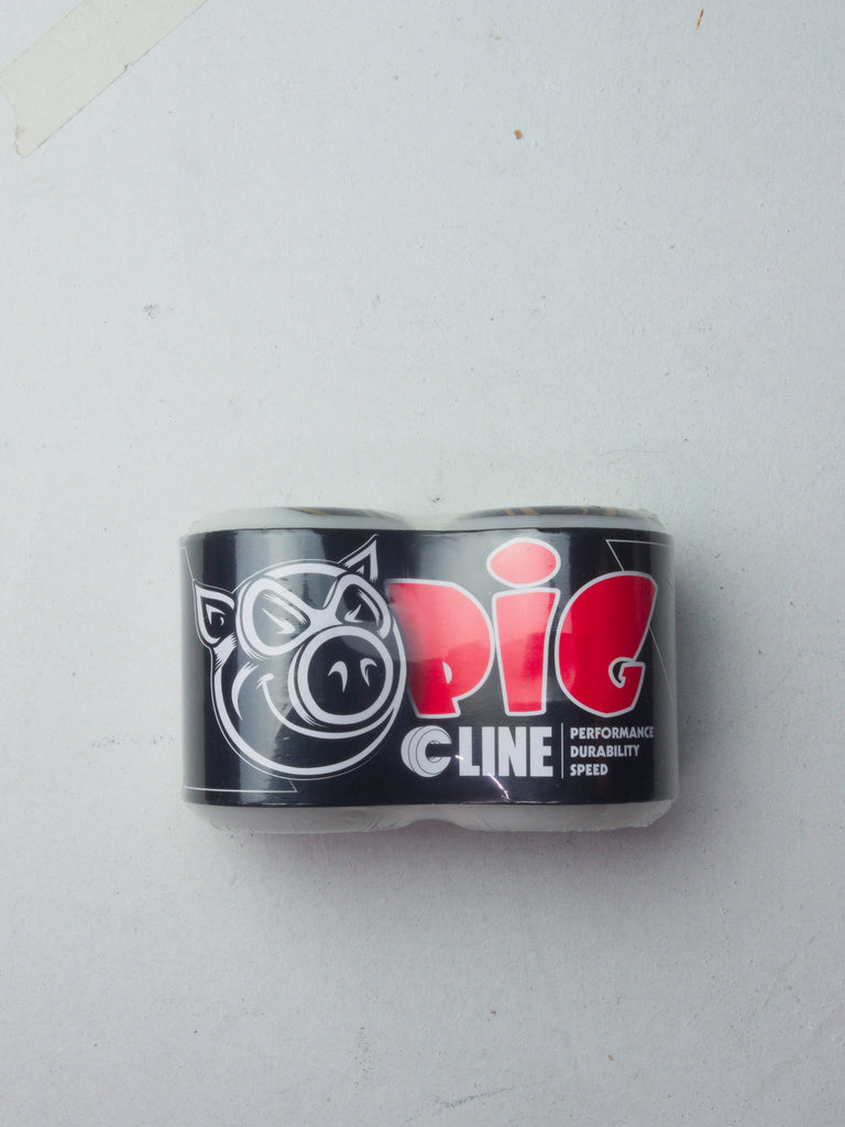 Black and red can of Pig Cline with a cartoon pig logo.