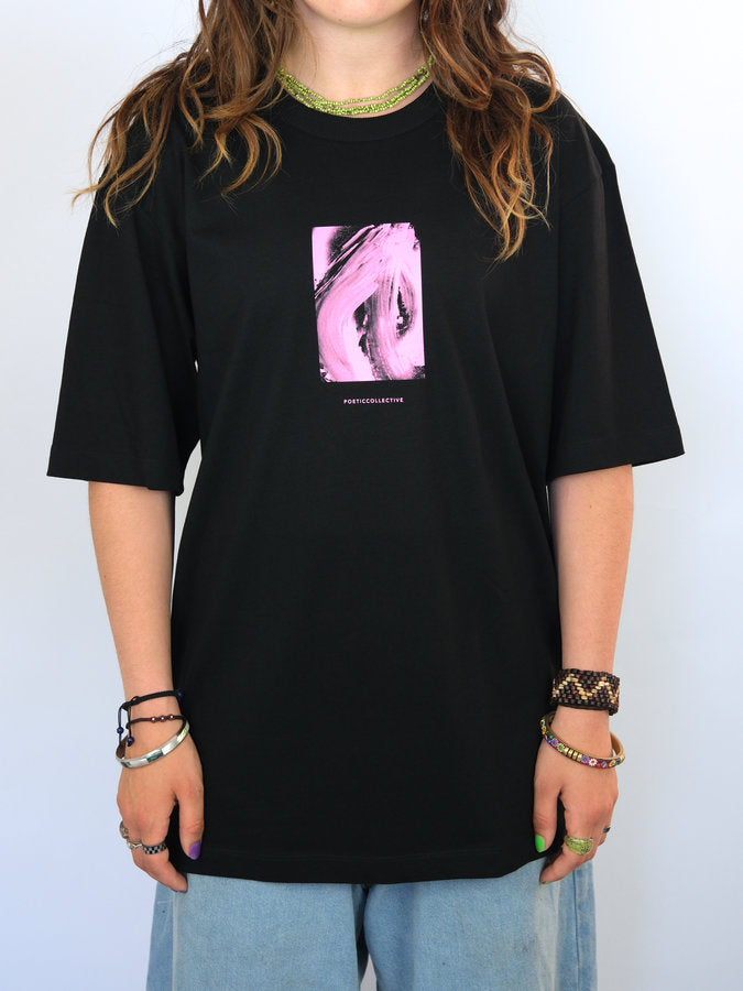 Black t-shirt with a pink rectangular graphic design on the front.