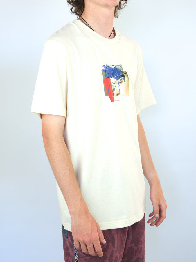 White t-shirt with a red and blue graphic design on the chest.