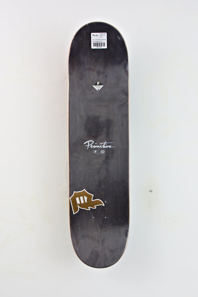 Black skateboard deck with a small brown bear logo and text graphics.