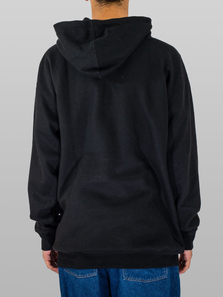 Black hooded sweatshirt in ultra heavy fleece worn with blue jeans by Snack Skateboards