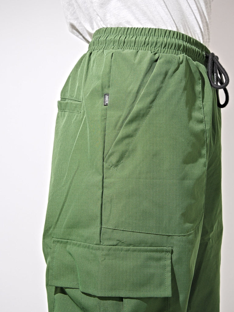 Khaki Green ninja cargo pants with multiple pockets and drawstring waist for versatile style