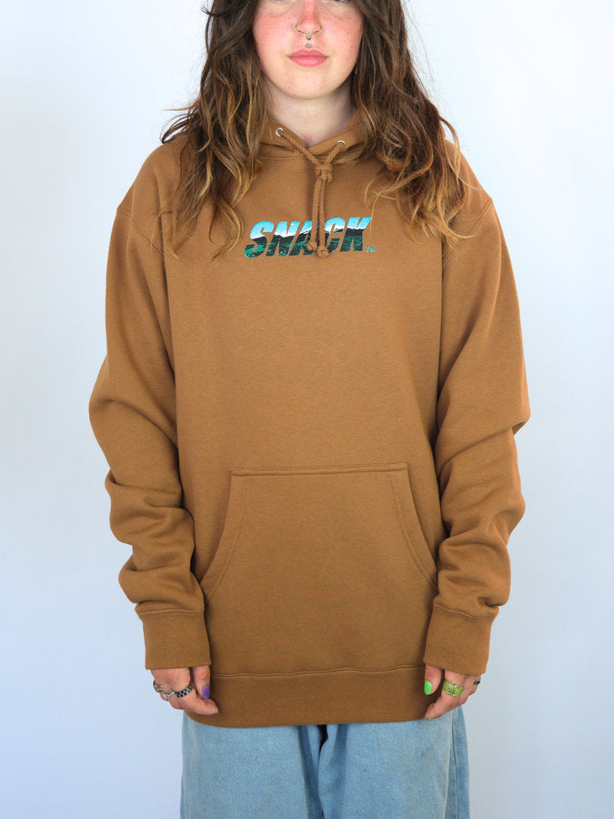 Brown Terrain Hoodie from Snack Skateboards featuring blue and white ’SNACK’ print