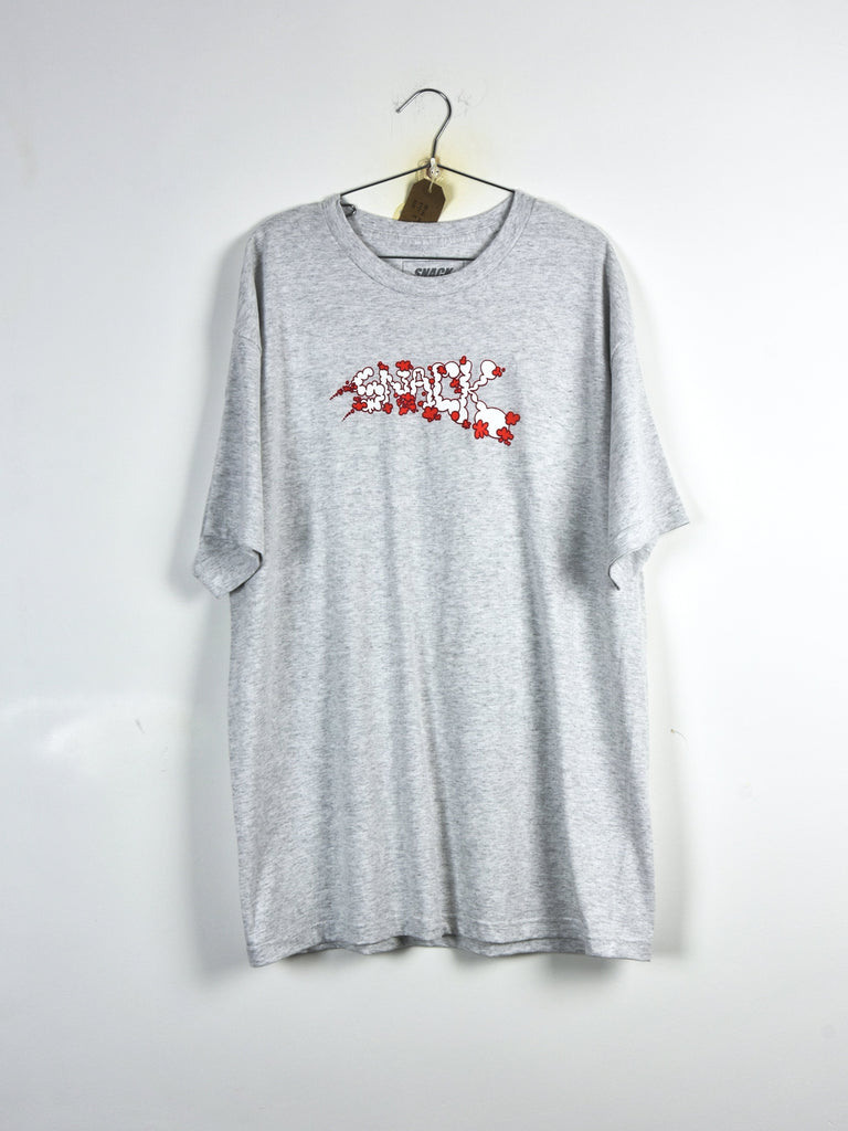 Light gray t-shirt with red graphic text design hanging on a hanger.