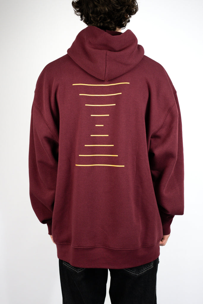 Burgundy Lines Hoody from Sour Solution featuring minimalist yellow design on back