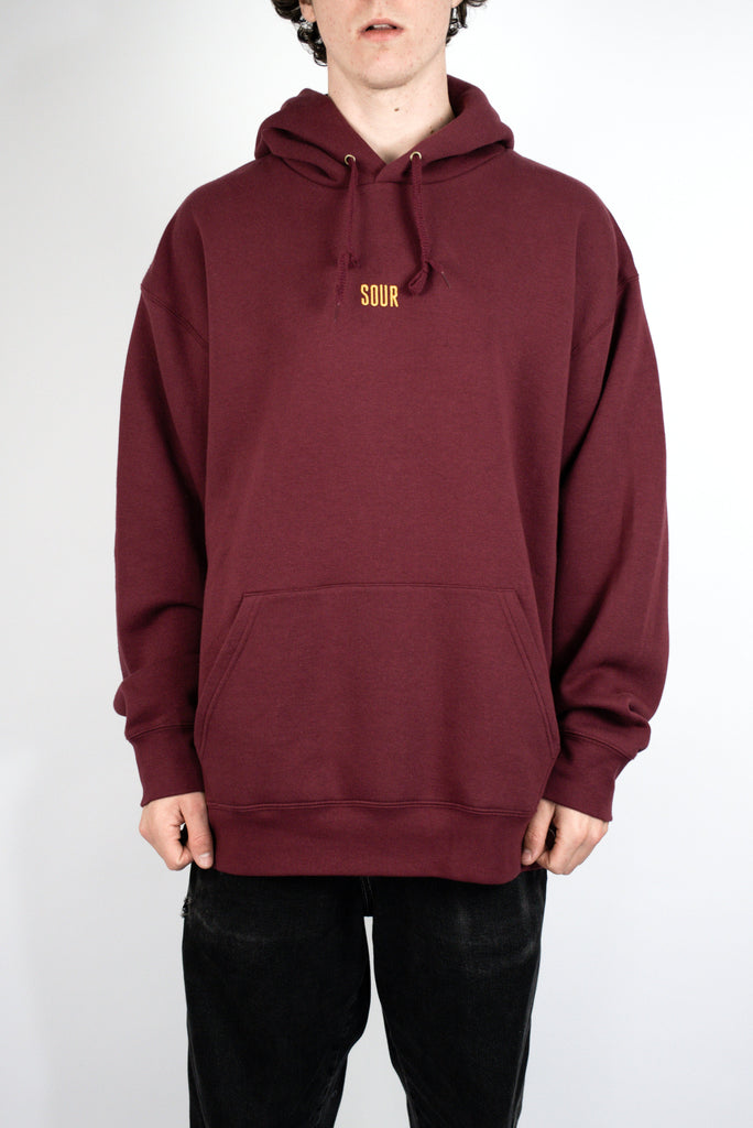 Burgundy Lines Hoody featuring yellow SOUR print on the chest by Sour Solution