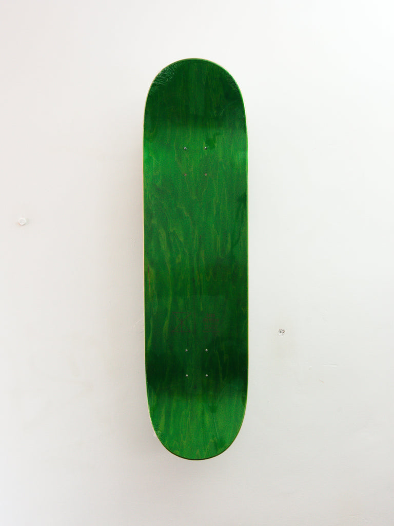 Green skateboard deck with a glossy finish.