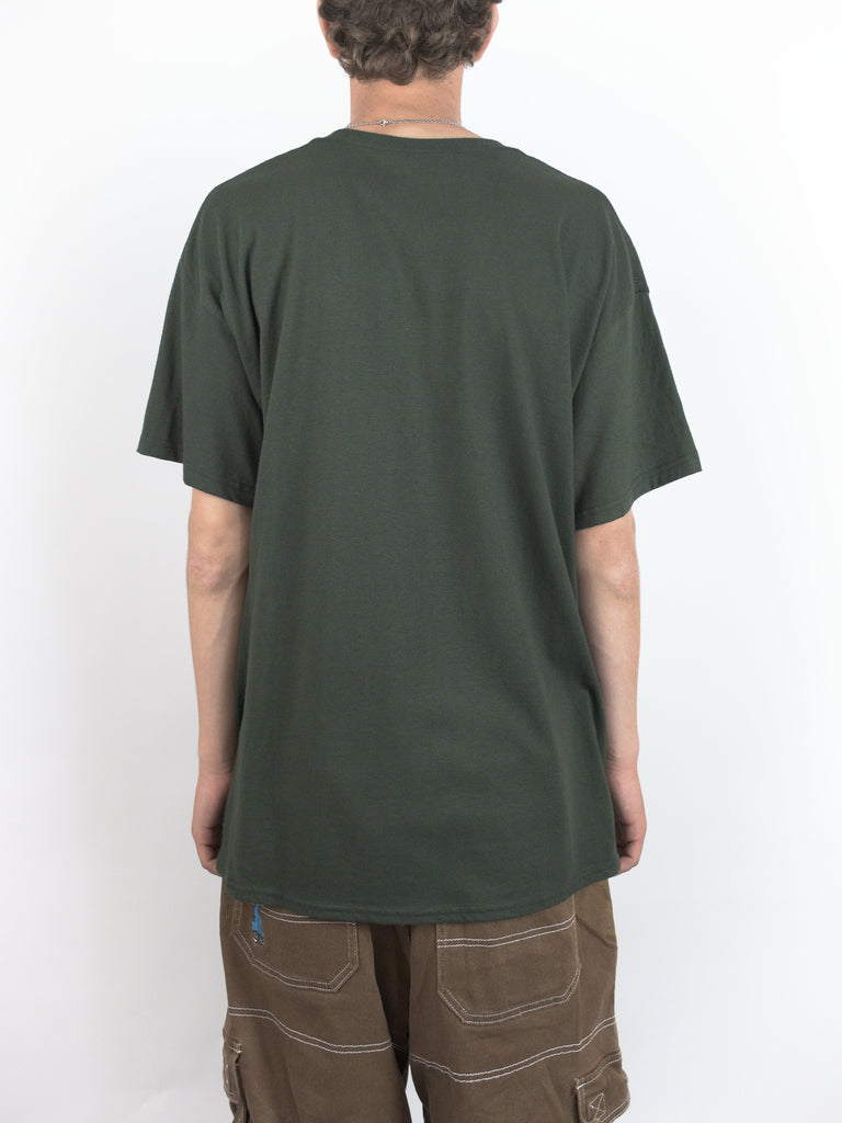 Dark green t-shirt worn from behind, featuring Sour Solution by Grind Supply Co