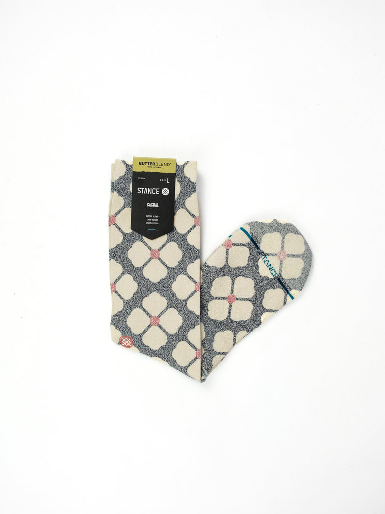 Pair of patterned socks with a geometric design.