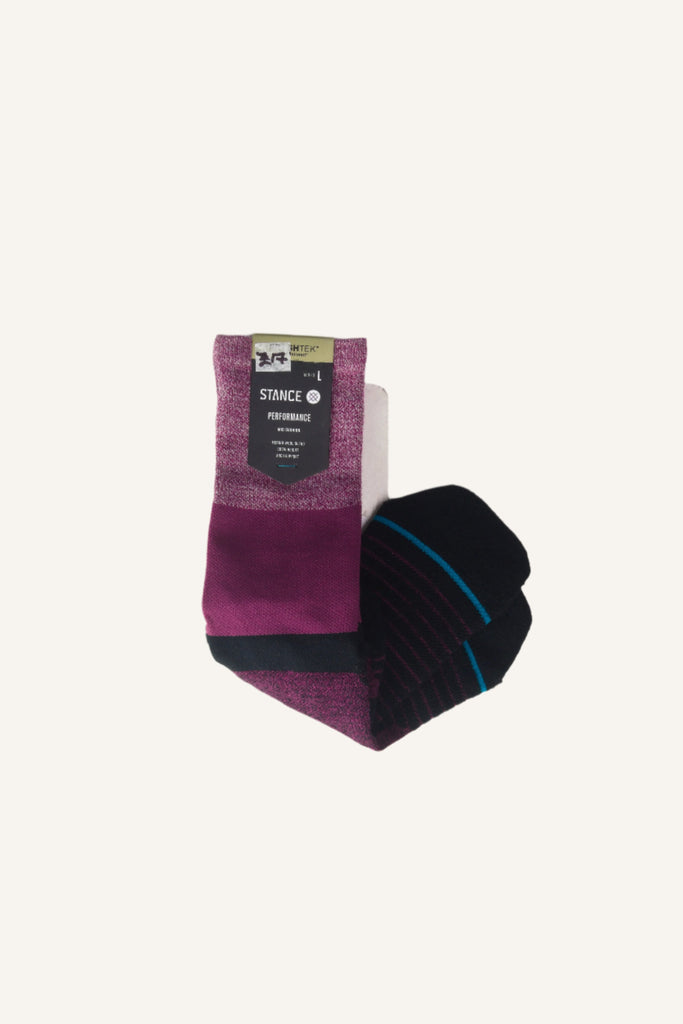 Purple and black athletic sock with a blue accent stripe.