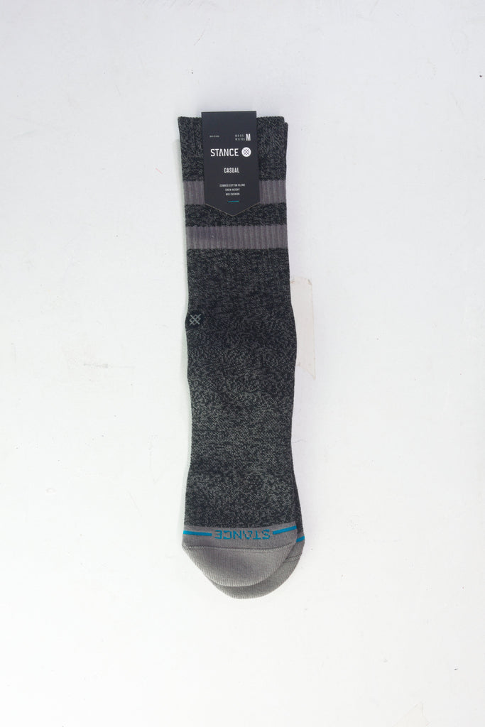 Dark gray sock with blue accent at the toe.