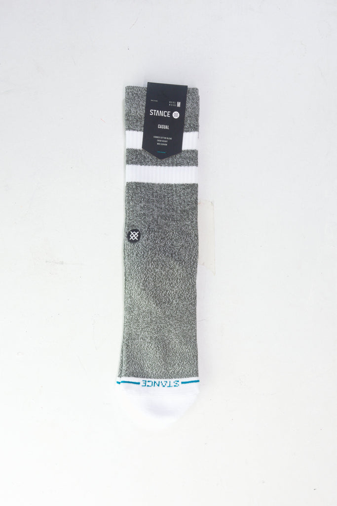 Gray athletic sock with white toe and blue stripe detail.