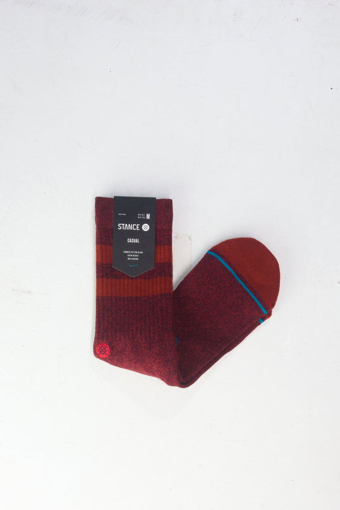 Red sock with a blue stripe accent.