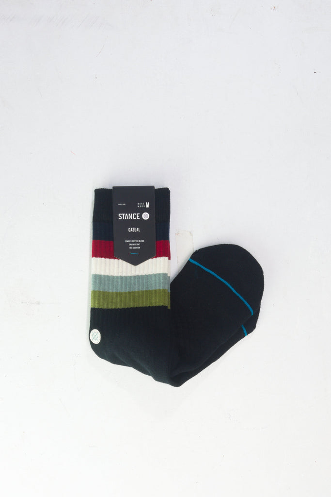 Black athletic sock with colorful striped band detail and blue accent line.