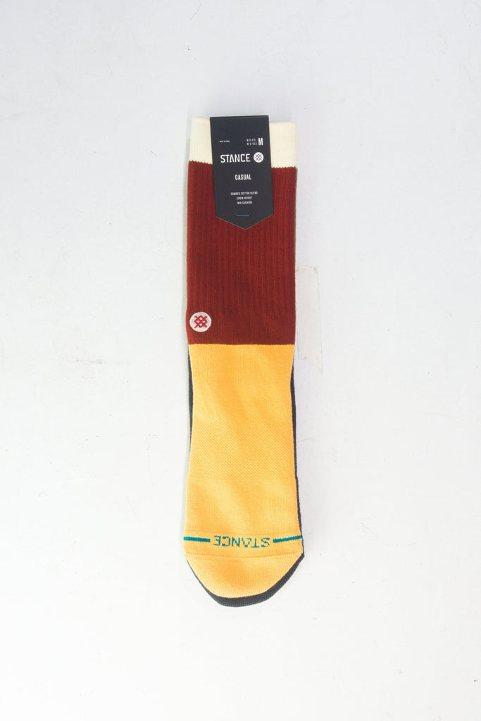 Yellow and burgundy athletic sock with navy blue accents.