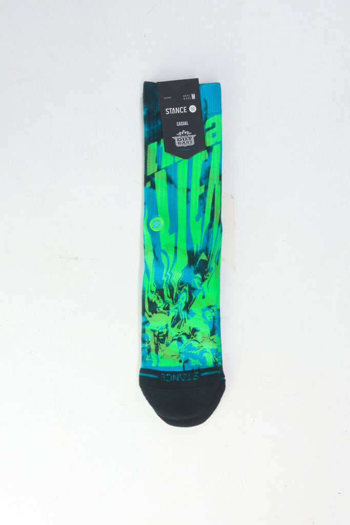 Colorful sock featuring a vibrant green and blue abstract pattern with black accents.