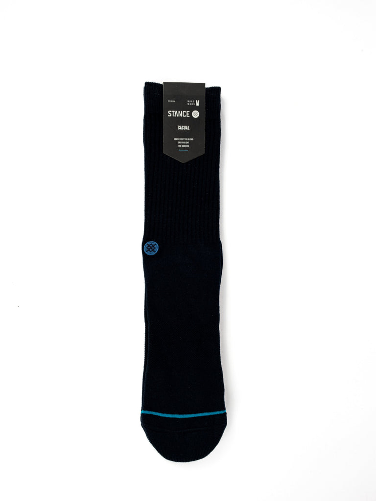 Black dress sock with blue accents at the toe and ankle.