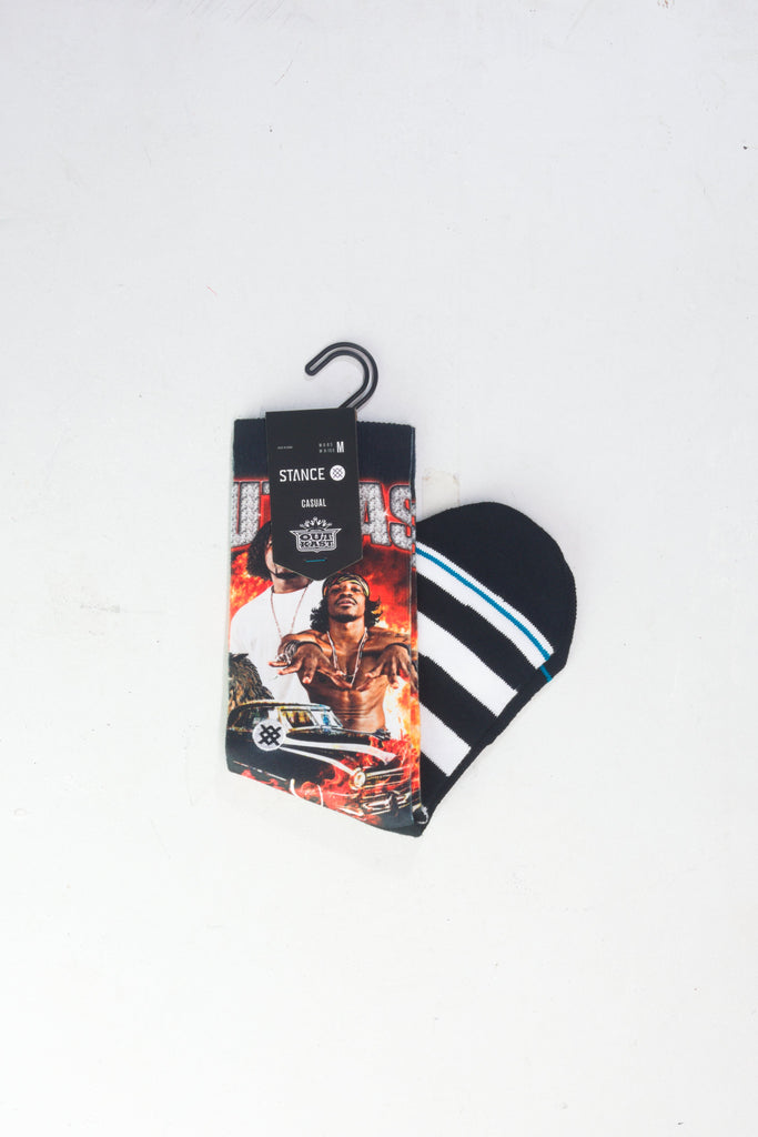 Star Wars themed socks with black and blue stripes still attached to their retail hanger.