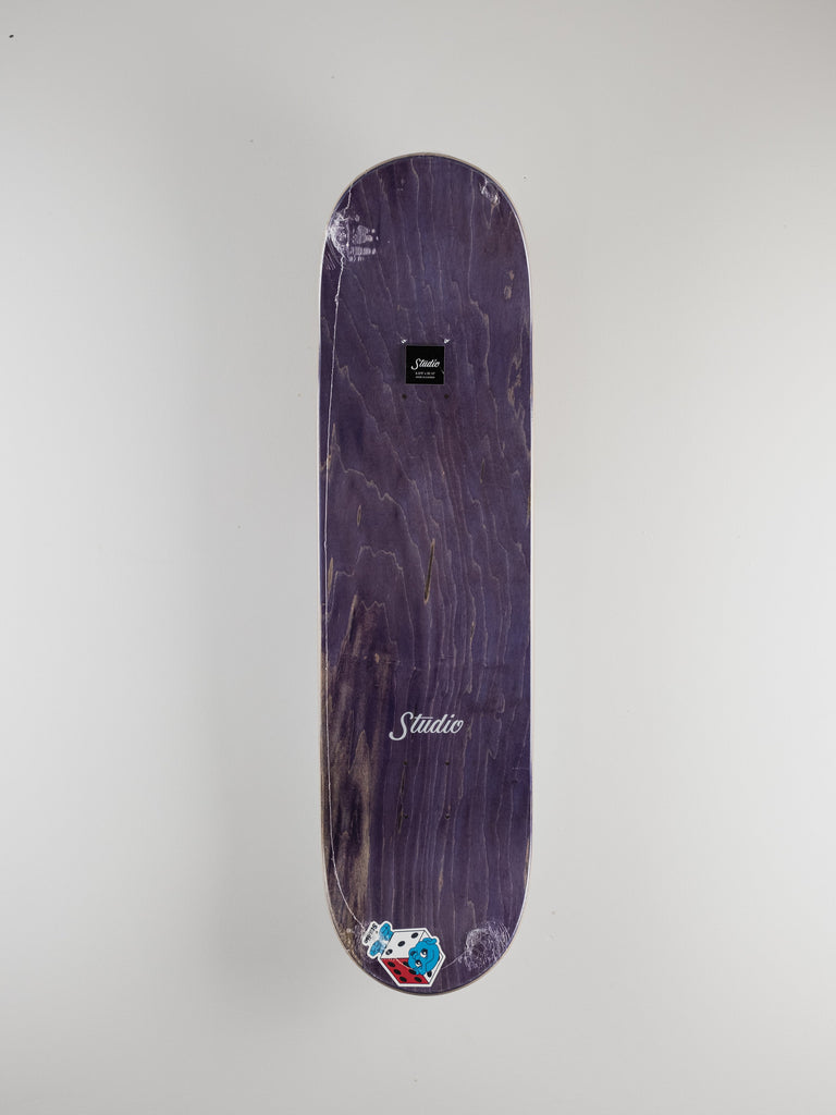 Purple skateboard deck with a wood grain pattern and small logo details.