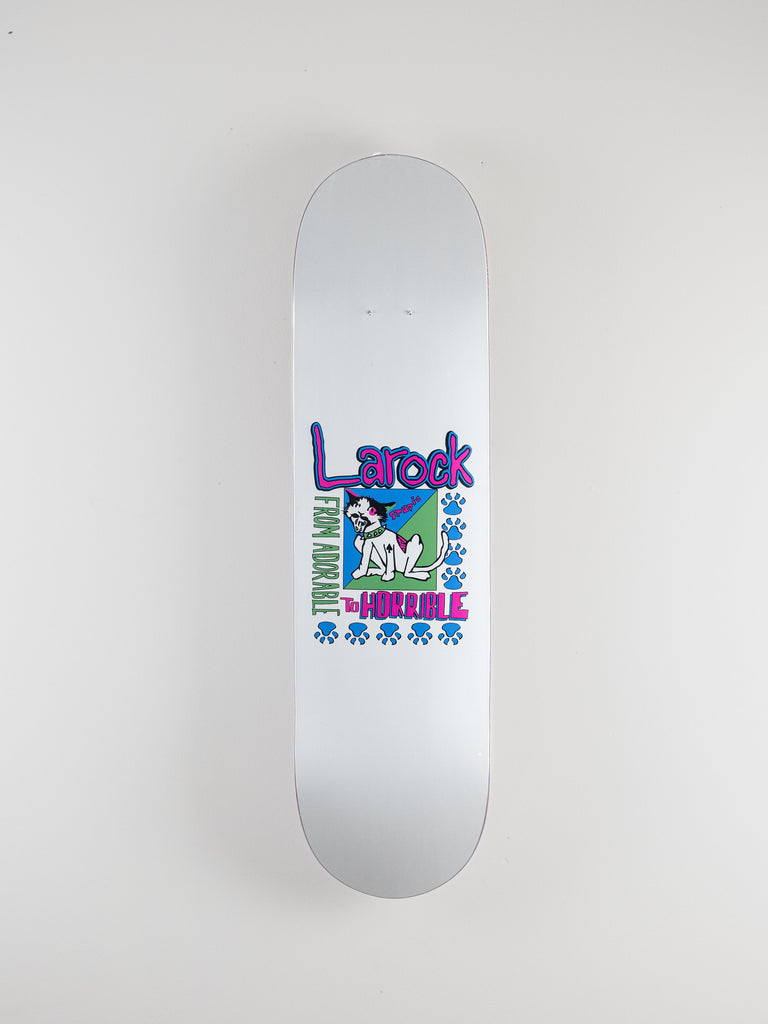 White skateboard deck featuring a colorful cartoon dog graphic and ’Lstrock’ text.