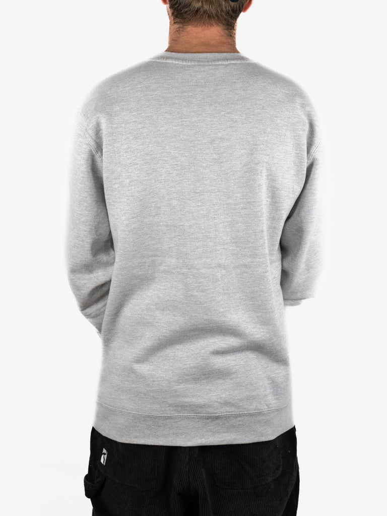 Light gray crewneck sweatshirt from Studio Skateboards in heather grey, small script design