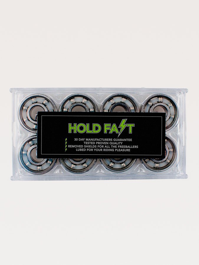Package of skateboard or roller skate bearings labeled ’Hold Fast’ with a 30-day guarantee.