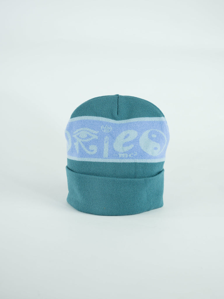 Teal winter beanie with a light blue patterned band around the middle.