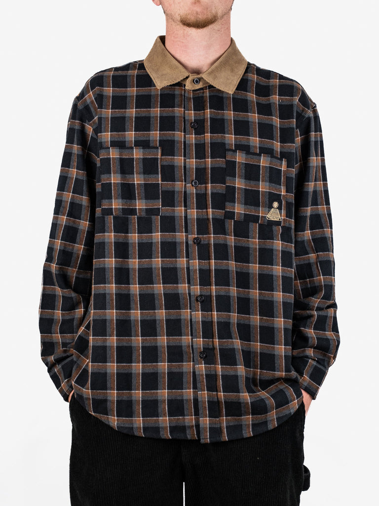 Plaid flannel shirt with a tan collar and chest pockets, featuring Atlantis Cascadia Cord Collar design