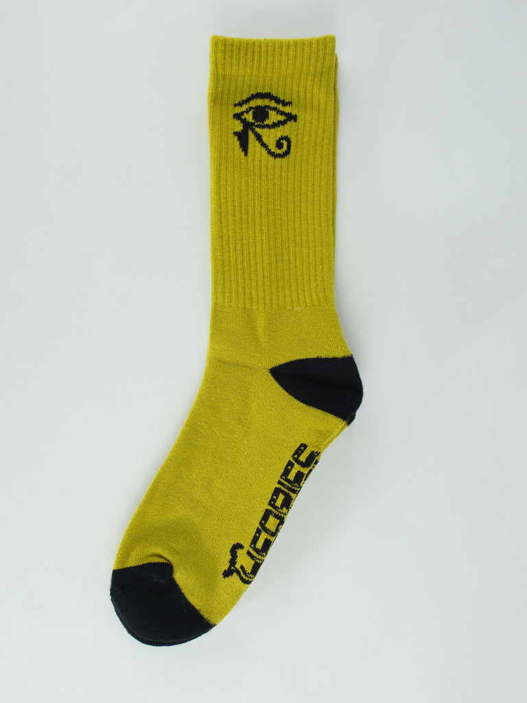 Yellow athletic sock with black accents and an eye symbol design.