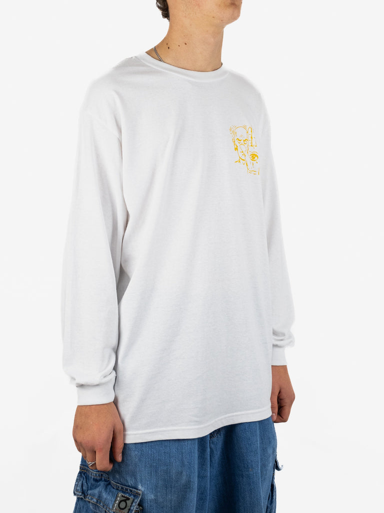 White long-sleeved shirt with a small yellow graphic on the chest.