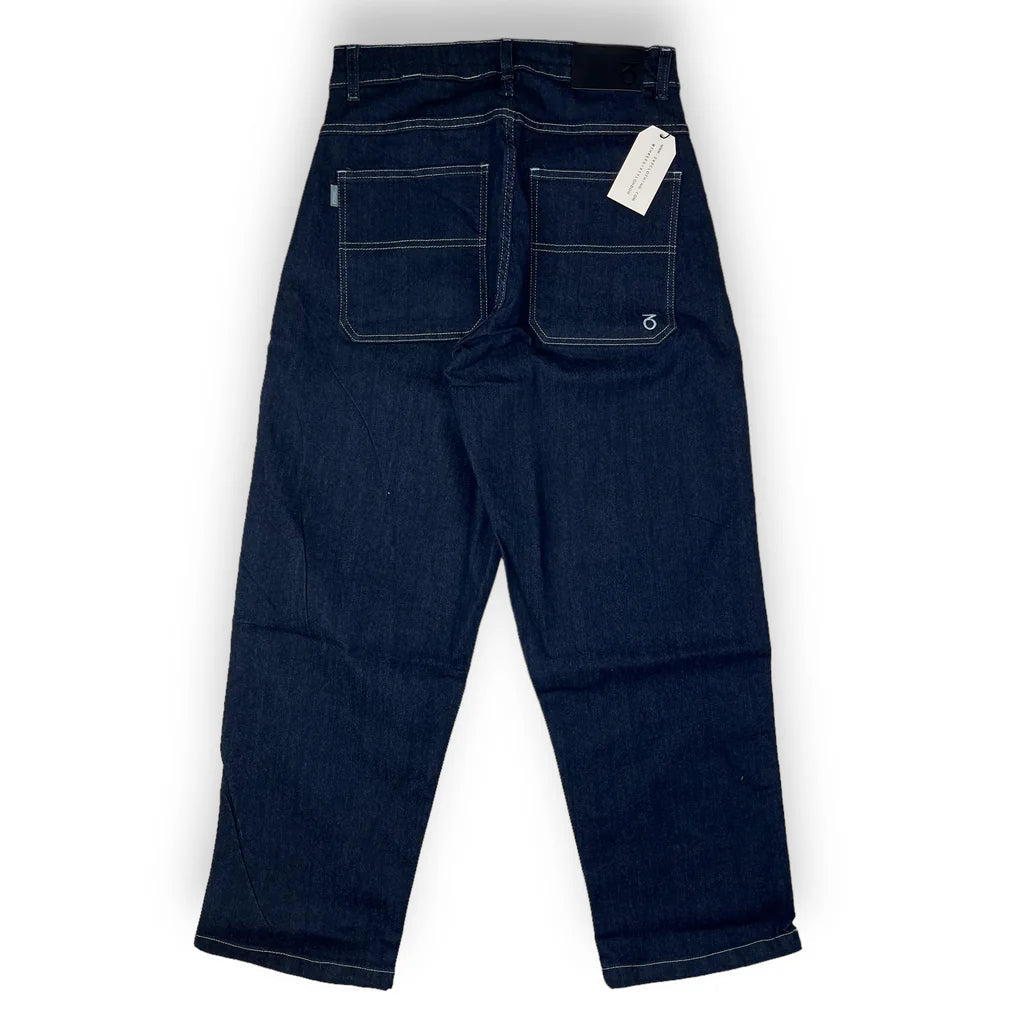 Dark blue cargo pants with contrast stitching and utility pockets.