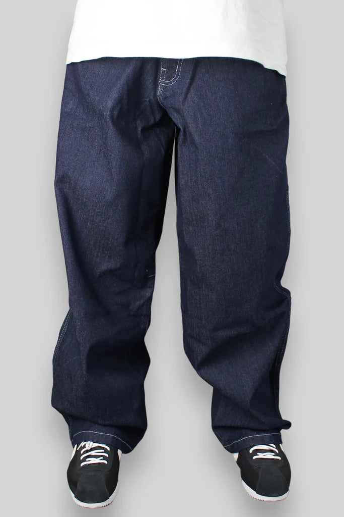 Navy blue casual pants with black sneakers.