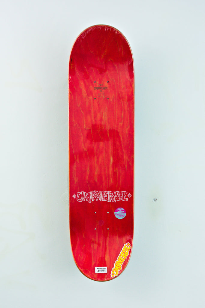 Red skateboard deck with white text and a small yellow detail.