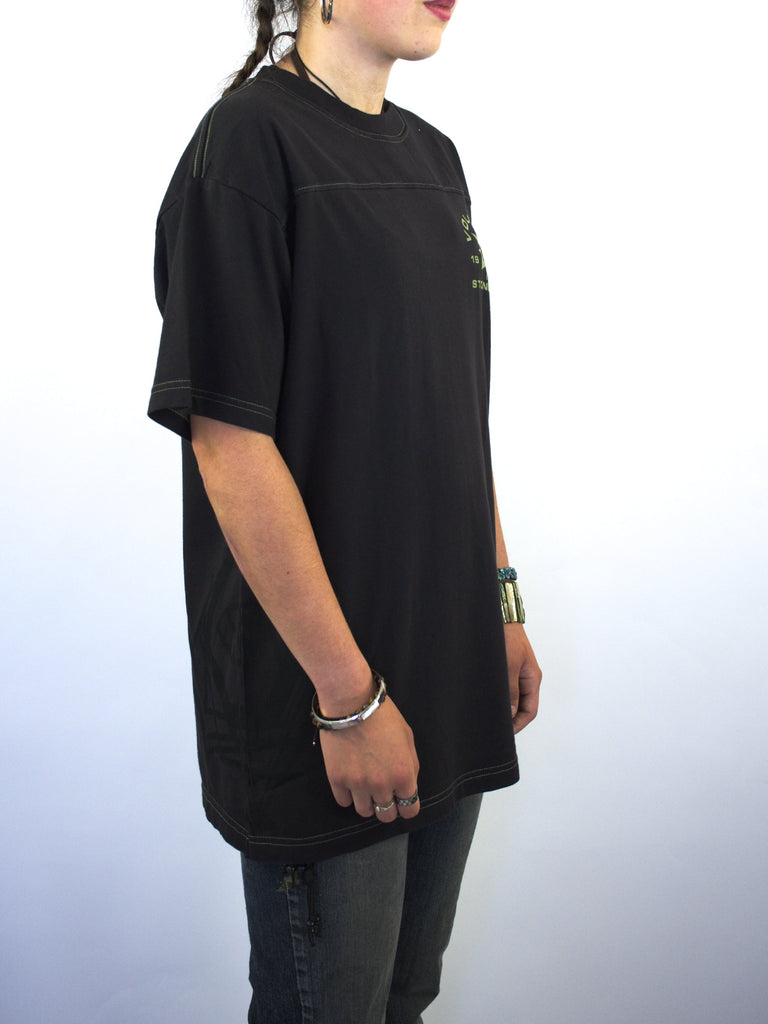 Plain black oversized t-shirt with short sleeves.