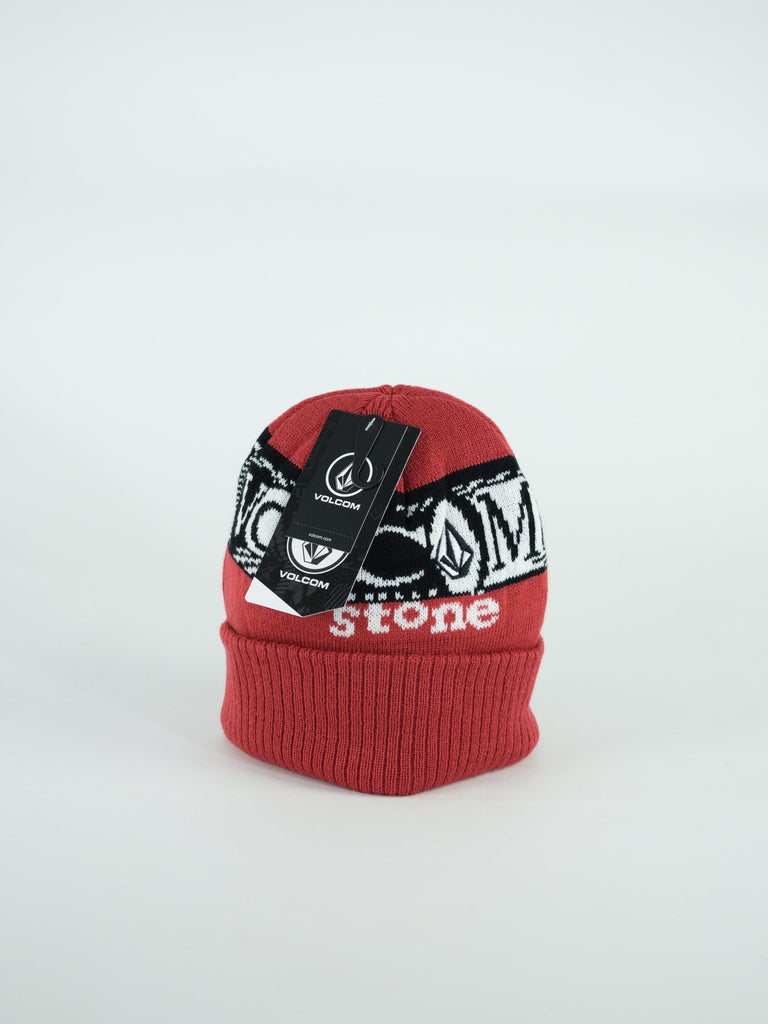 Red knit beanie with black and white graphic design.